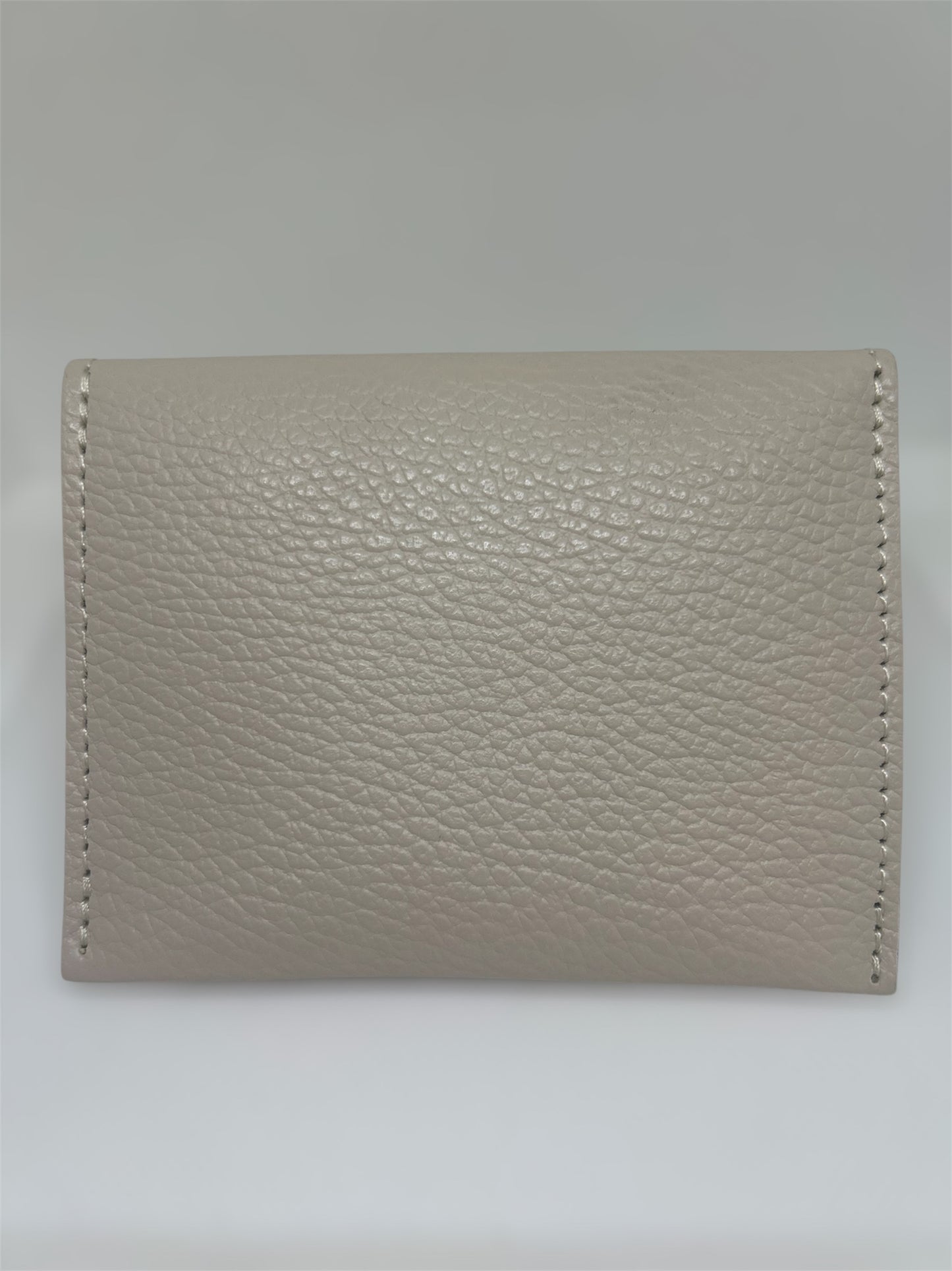 MONEDERO TACHUELAS BEIGE