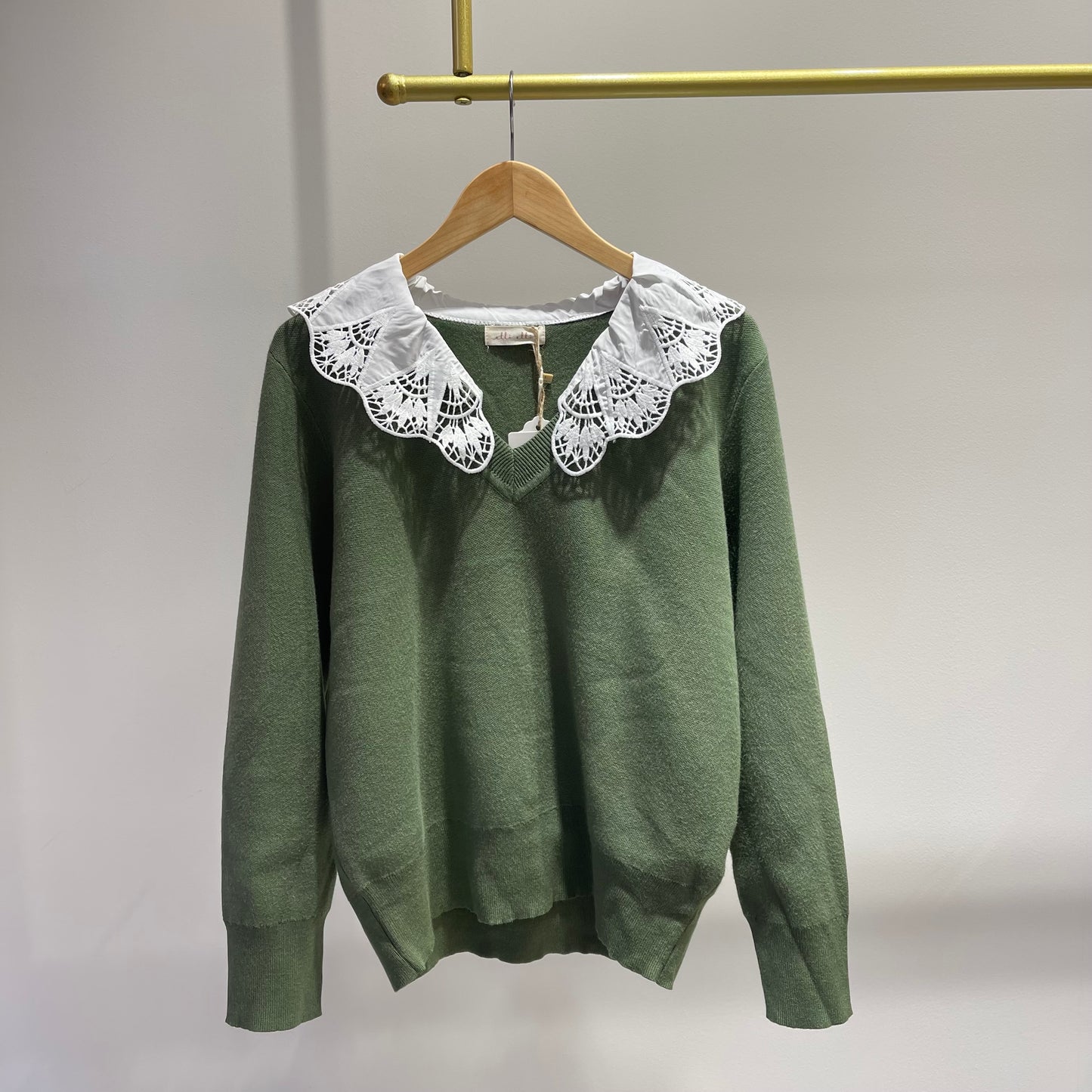 JERSEY VERDE CUELLO INTERIOR BLANCO