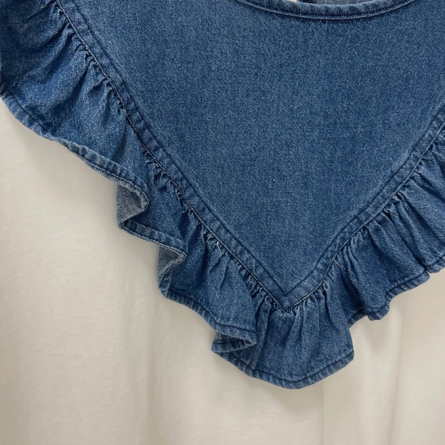 CAMISETA BLANCA DETALLE VAQUERO