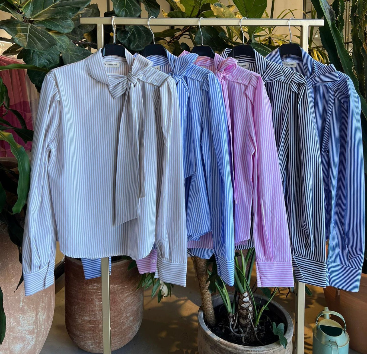 BLUSA RAYAS ROSA Y BLANCA CUELLO LAZO