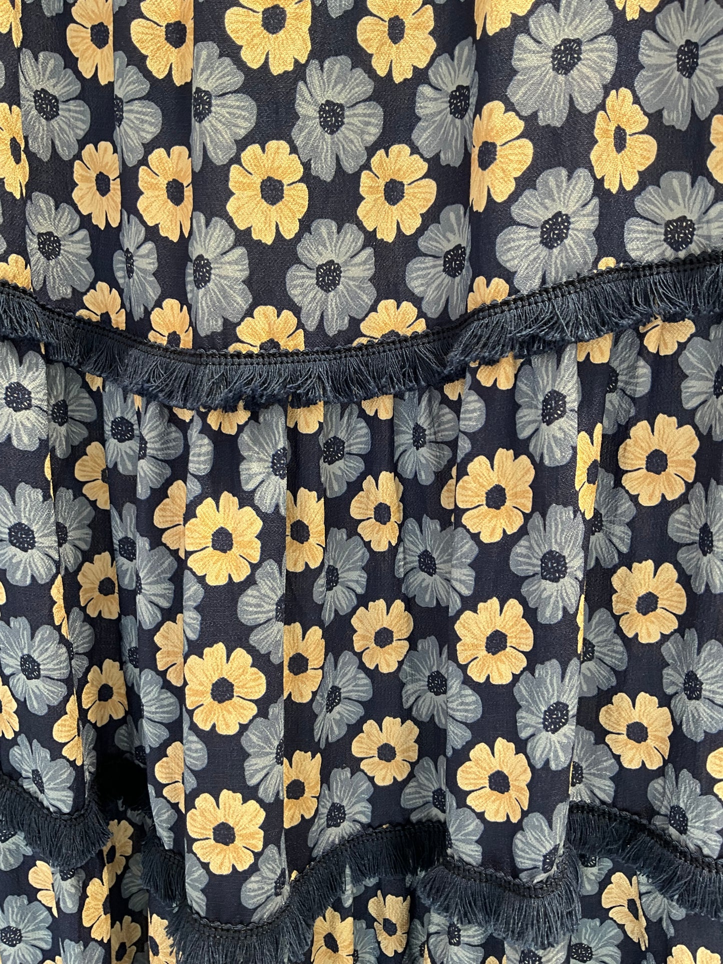 FALDA FLORES DETALLE FLECOS