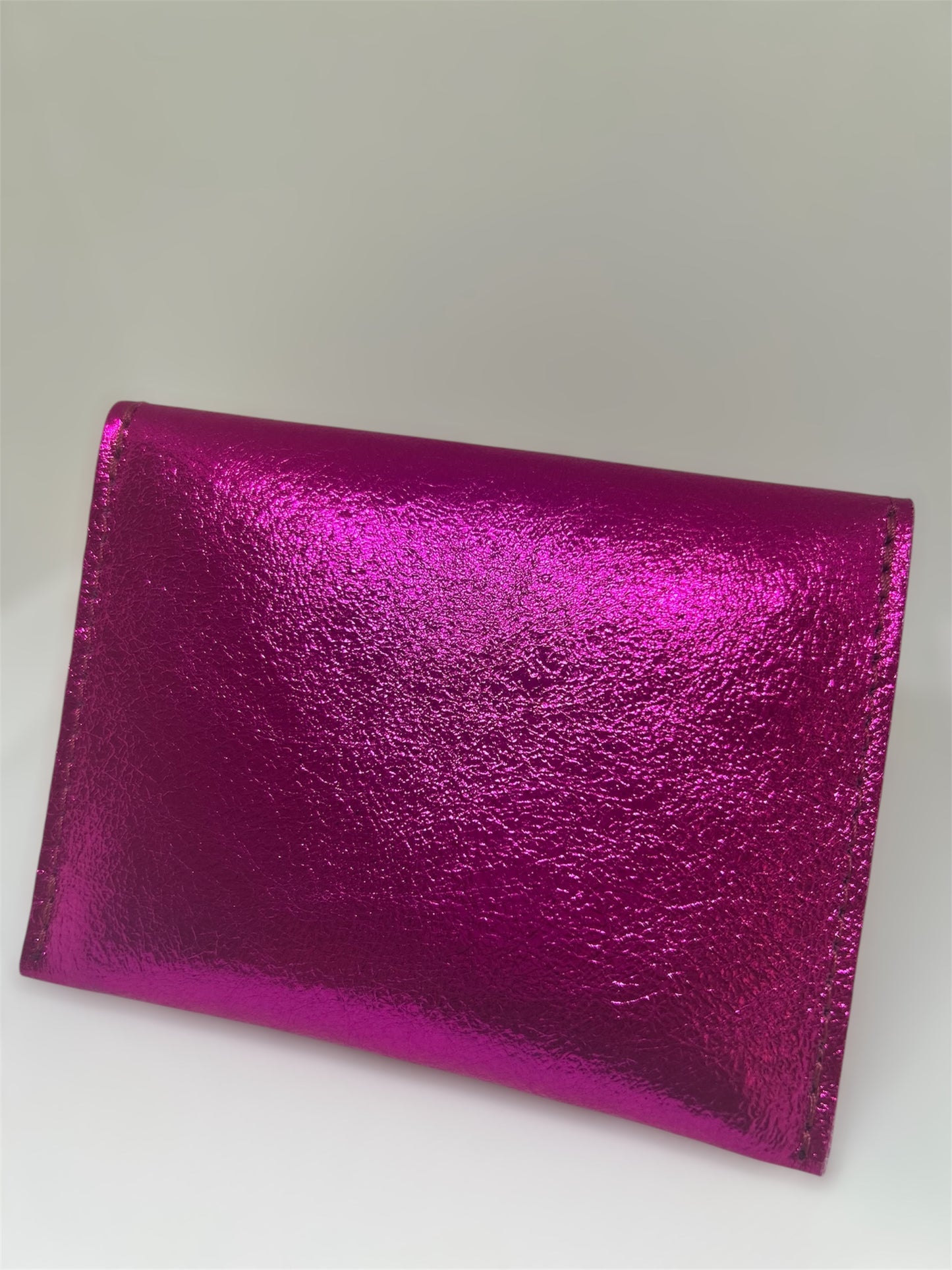 MONEDERO TACHUELAS FUCSIA